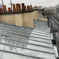 Rénovation complète d’un brisis en ardoise et d’une toiture en zinc