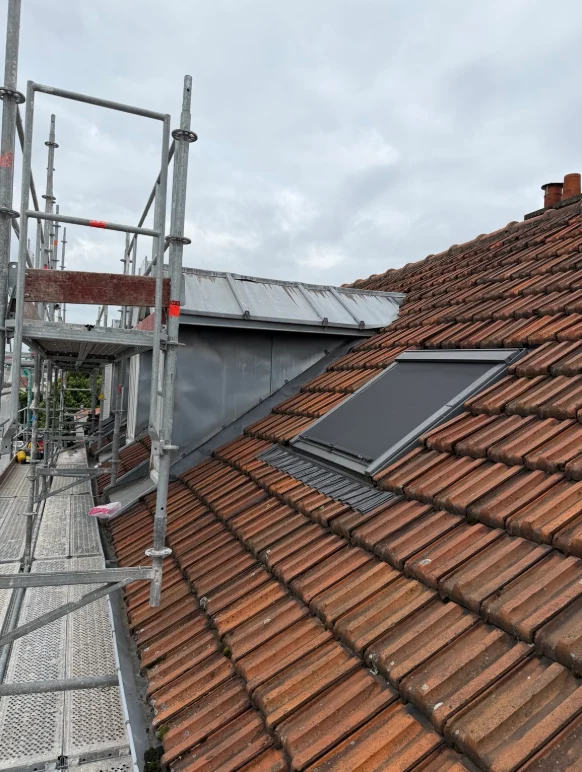 Rénovation complète de toiture et lucarne en zinc