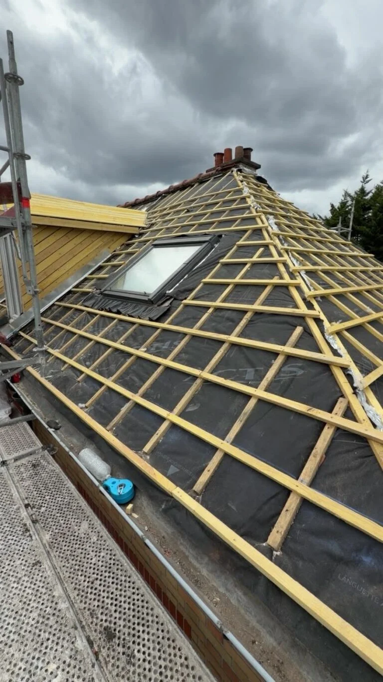 Rénovation complète de toiture et lucarne en zinc
