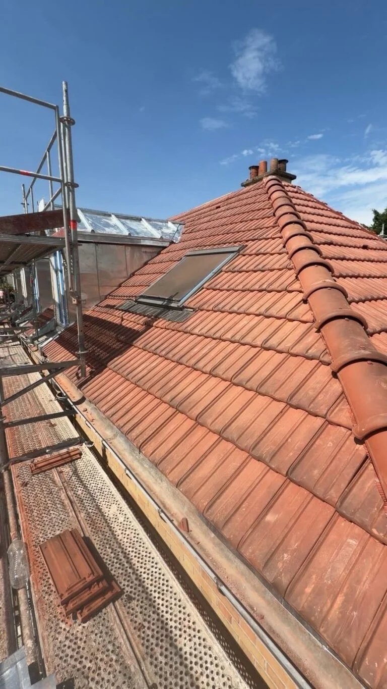 Rénovation complète de toiture et lucarne en zinc